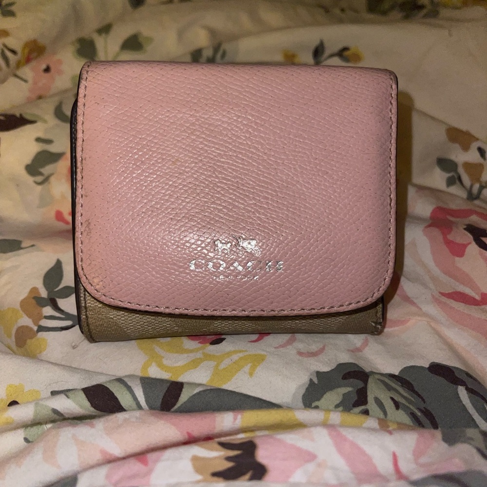 Authentic Coach Wallet. Pink and Tan. Lots of room for cards and cash.
